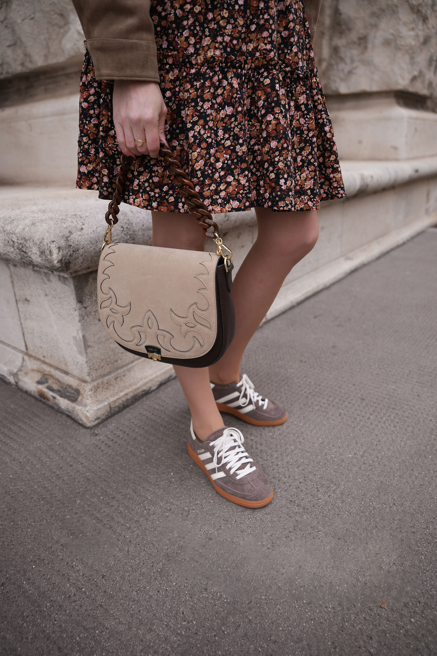 autumn outfit with brown leather jacket saaj skirt zoe lu bag sezane sweater adidas handball spezial sneakers